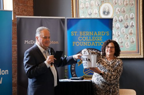 Andrew conducts the raffle with our Deputy Principal Therese Wilson